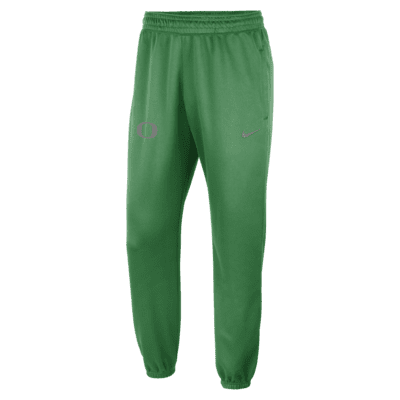 Nike track pants fashion green